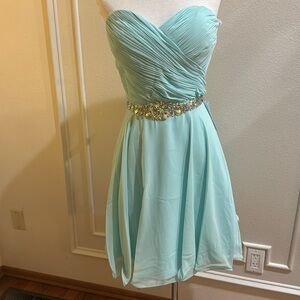 Short Part Dress.strapless sweetheart bodice ruched to the waist.